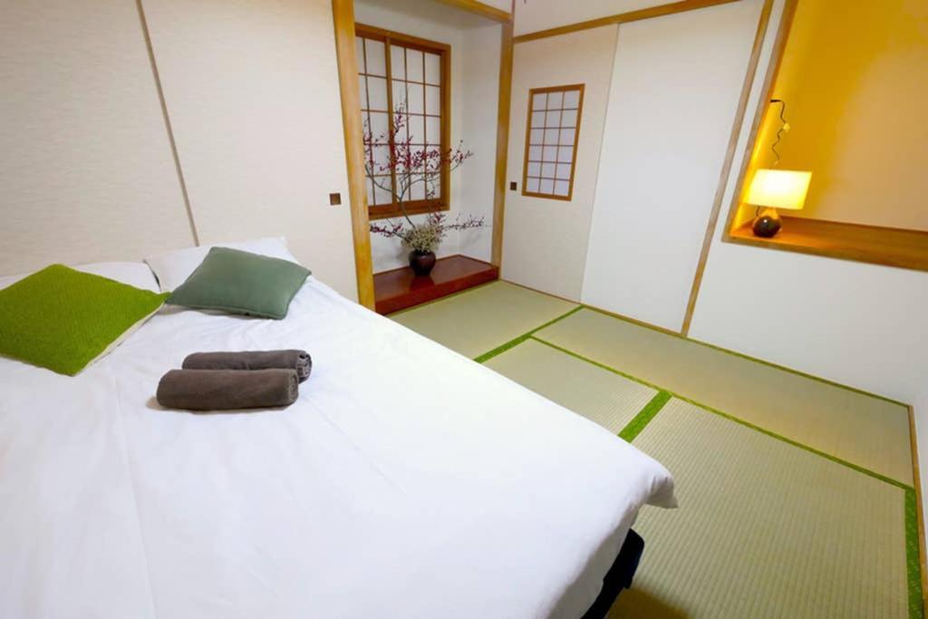 マスク配布ありa5 新宿10分 10人宿泊可能 出張在宅勤務に最適!!宿泊型テレワークスペース!!Wifi完備 回線安定してます!!長期宿泊受付中 Токио Экстерьер фото